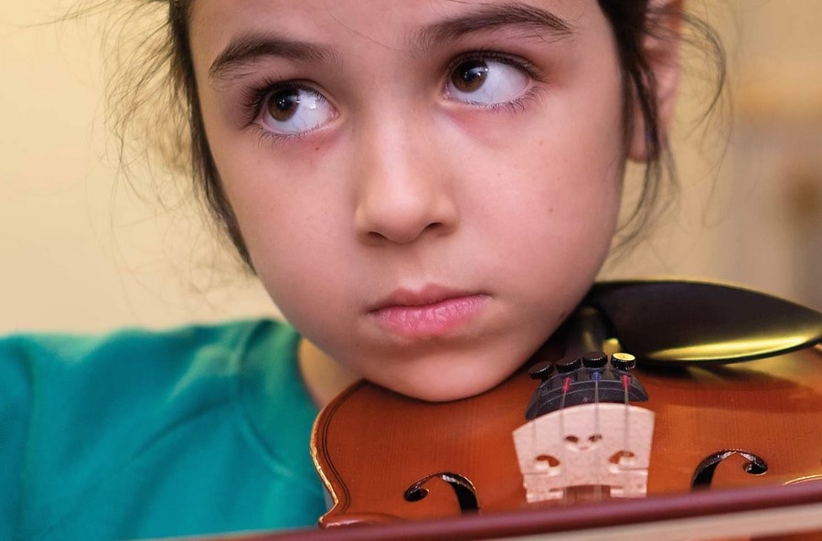 Fifty New Violins for Walnut Tree Walk Primary School